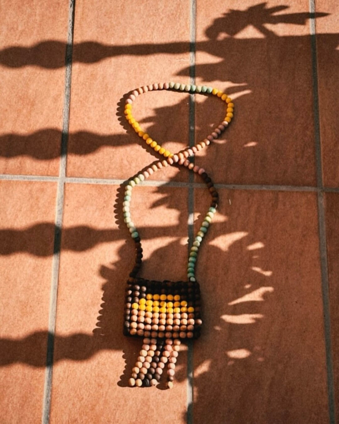 "Festival" beaded mini neck pouch