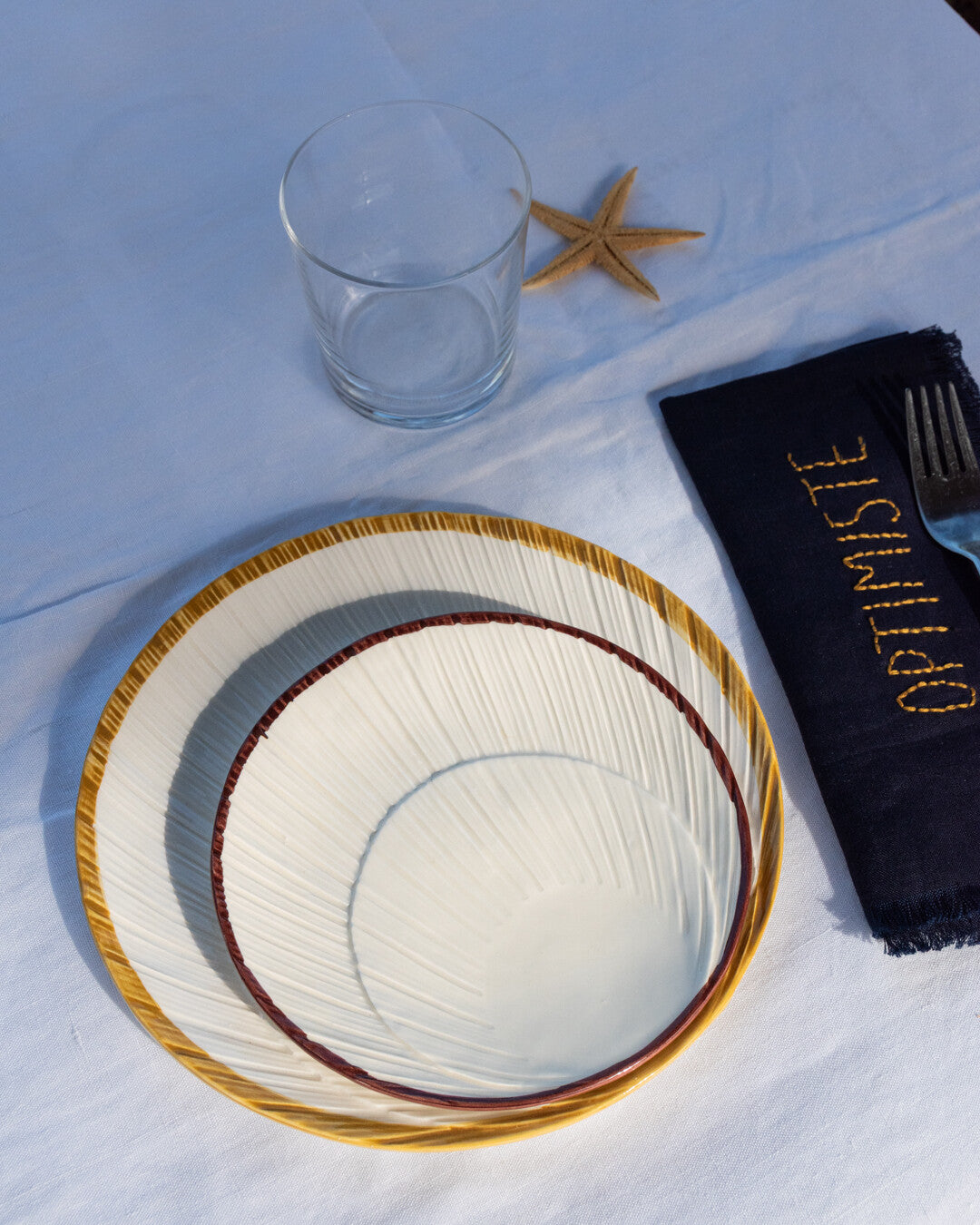 Konkylie side plate