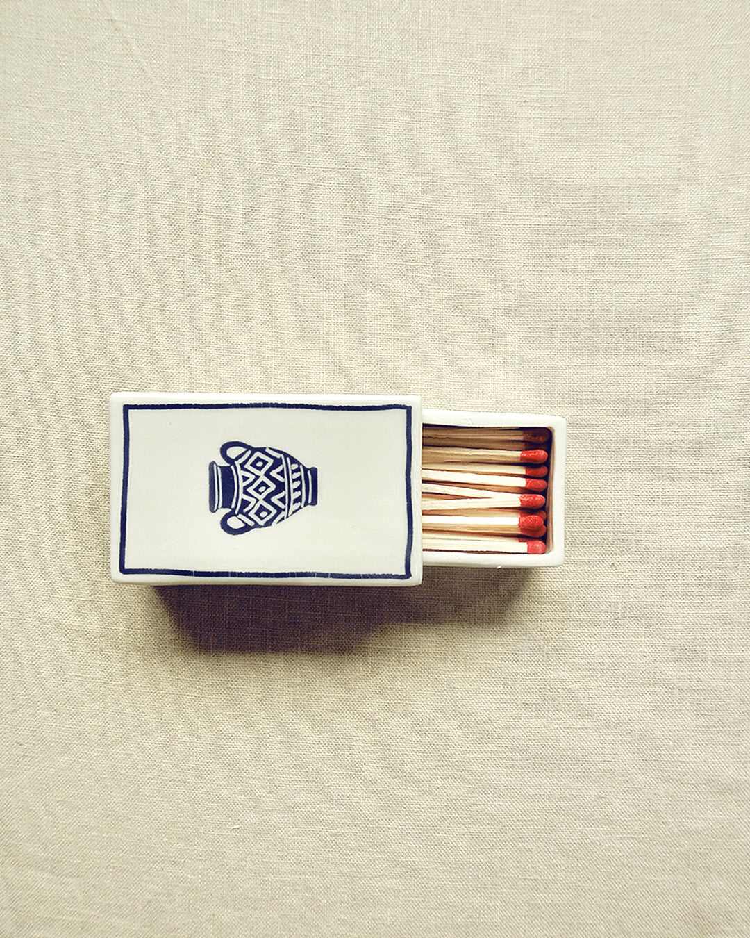 Scatola di fiammiferi illustrata in ceramica