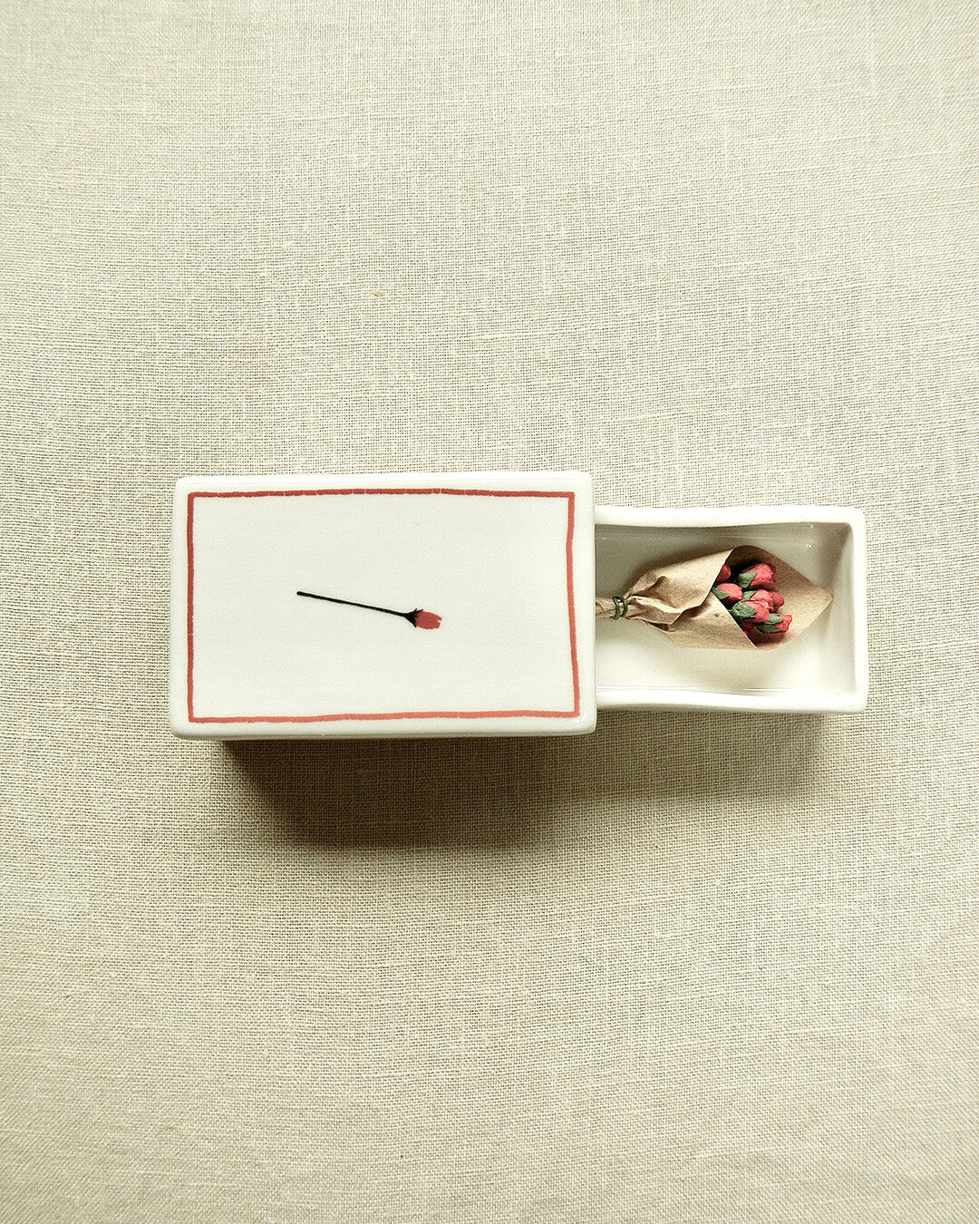 Scatola di fiammiferi illustrata in ceramica