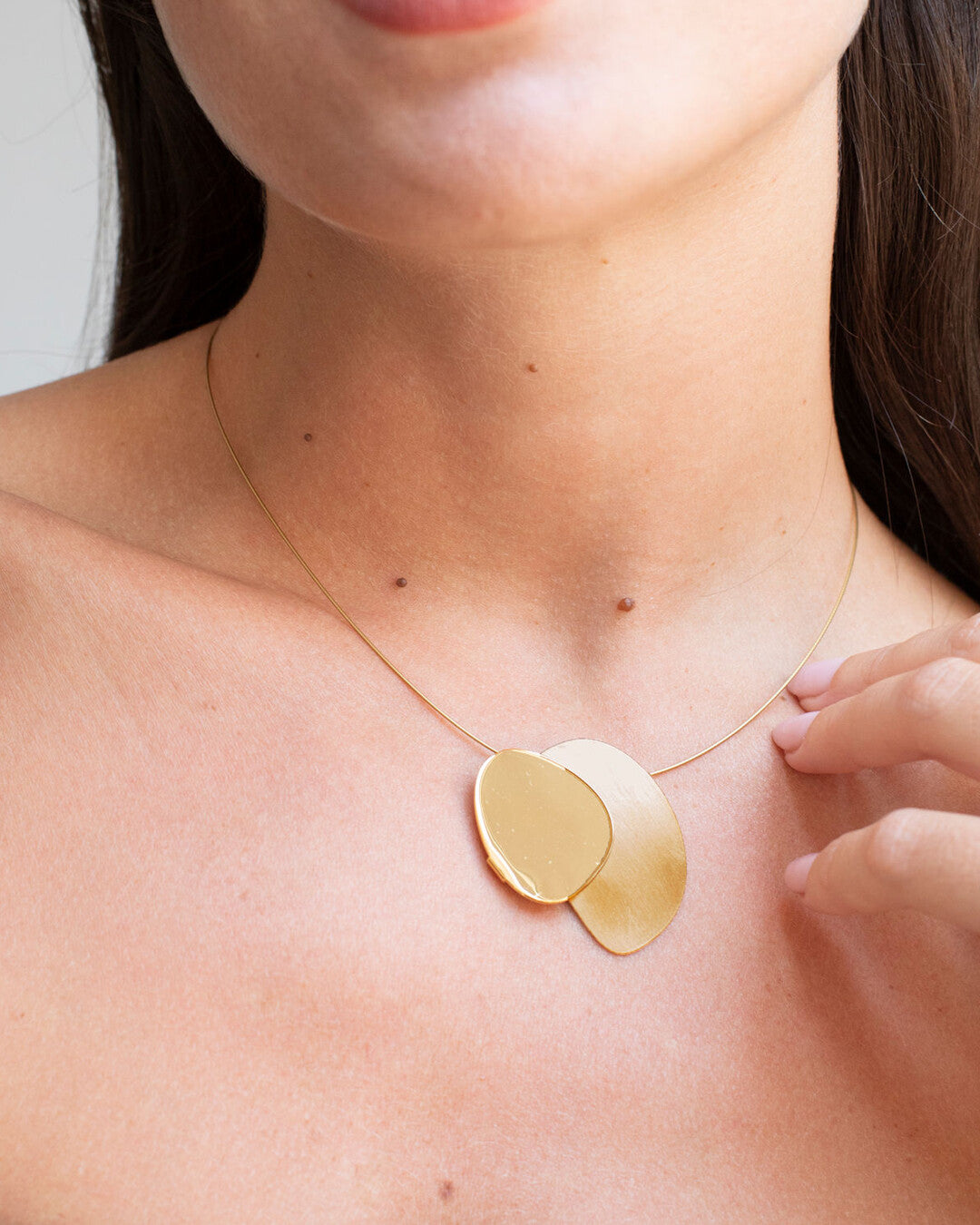 Golden necklace with pendant Eclipse