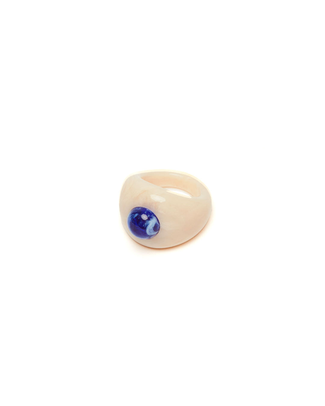 Ring with a blue gemstone on a white background