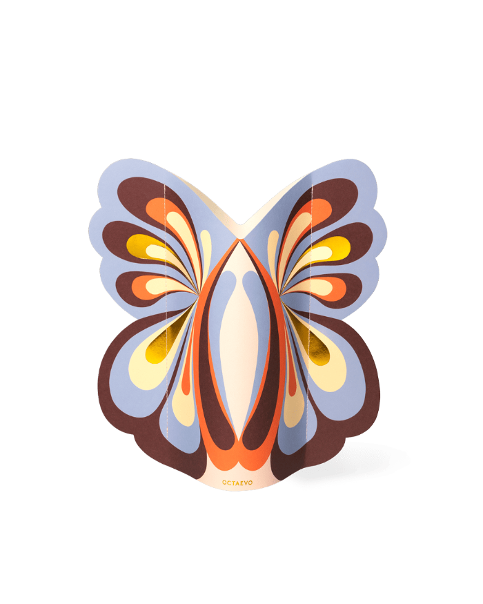The Butterfly Paper Vase by OCTAEVO adds a burst of color and abstract style to your vibrant décor.