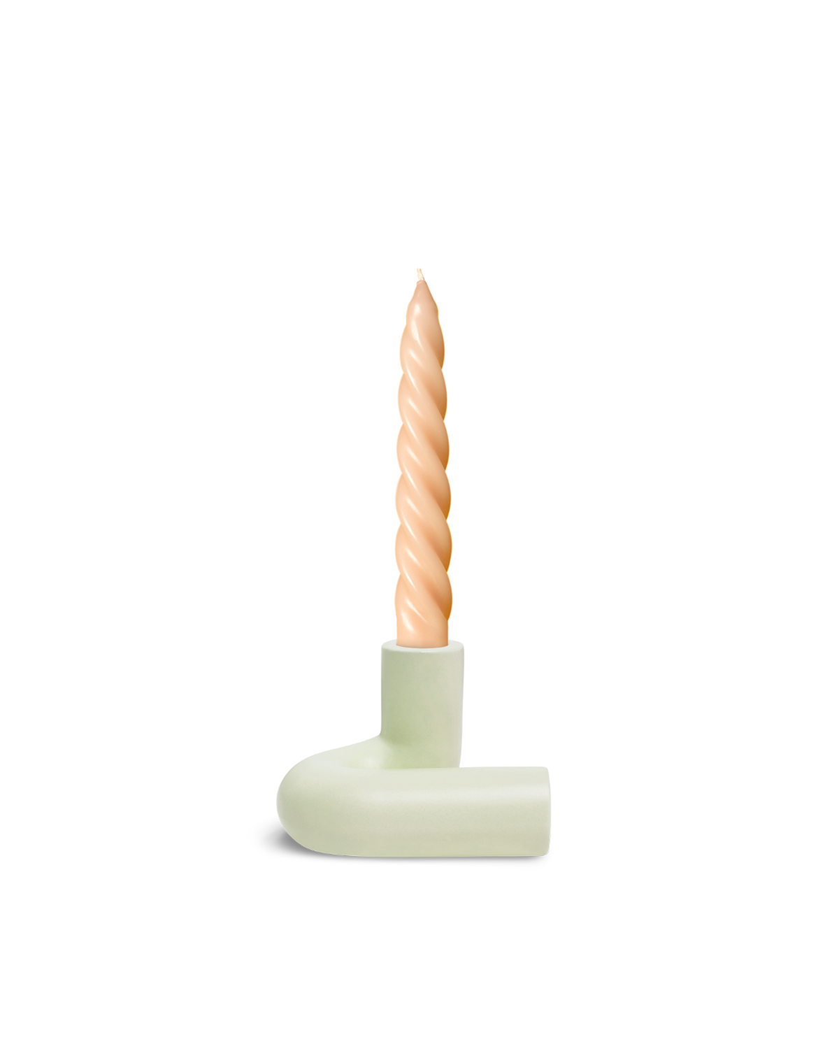 A twisted beige candle stands upright in OCTAEVO’s Templo Candle Holder, in Light Mint L-shaped chamberstick.