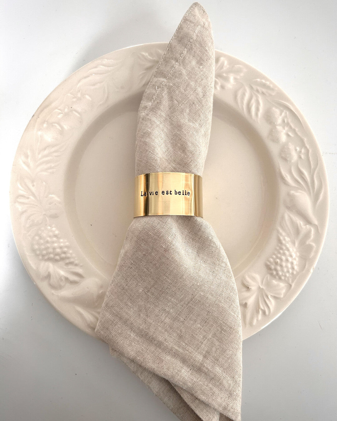 "La vie est belle" - Engraved brass napkin ring
