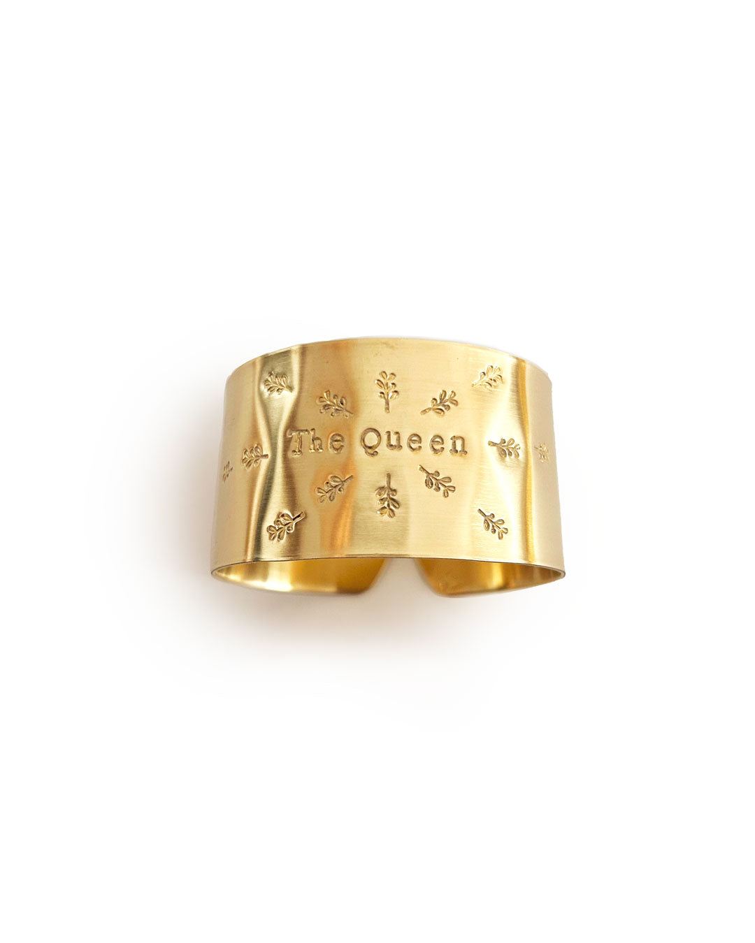 "The Queen" - Engraved brass napkin ring with twig symbols
