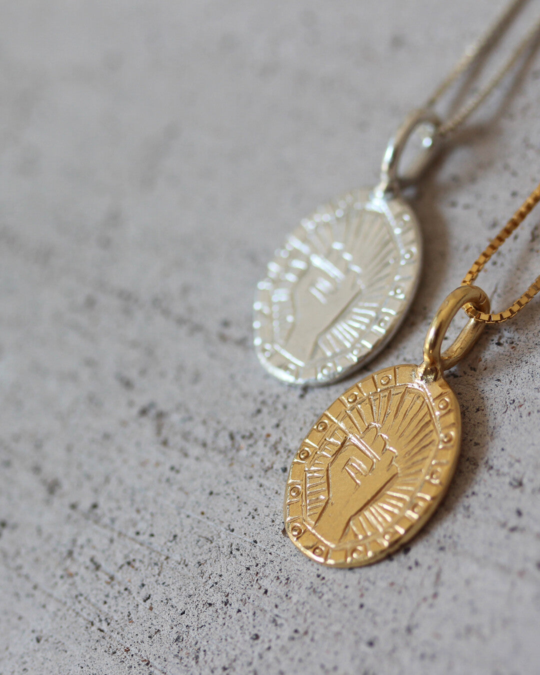 Fist necklace