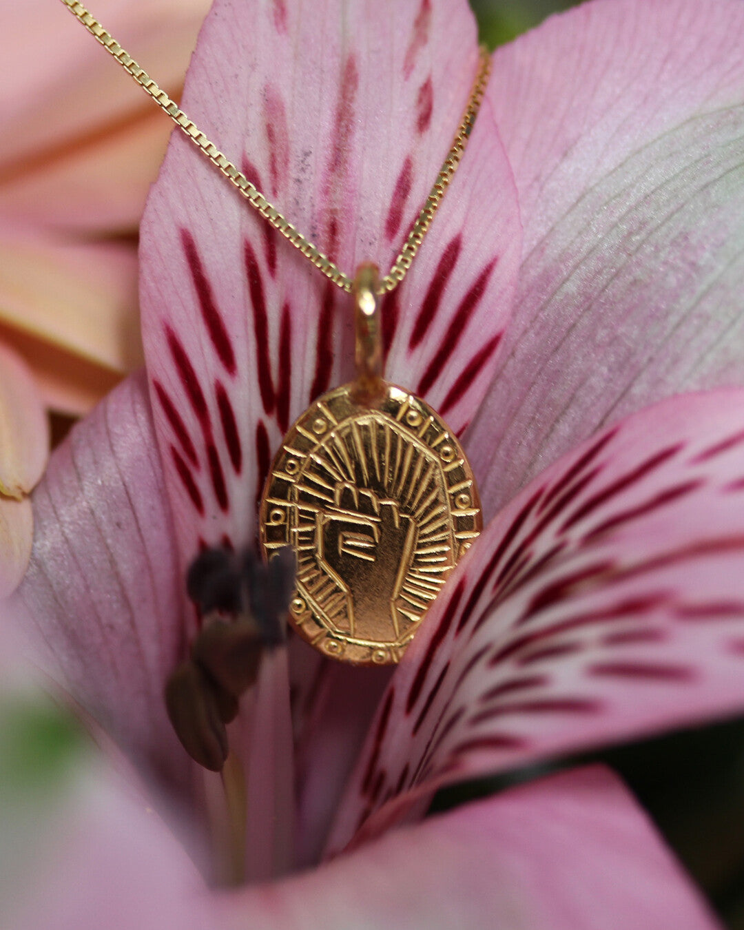 Fist necklace