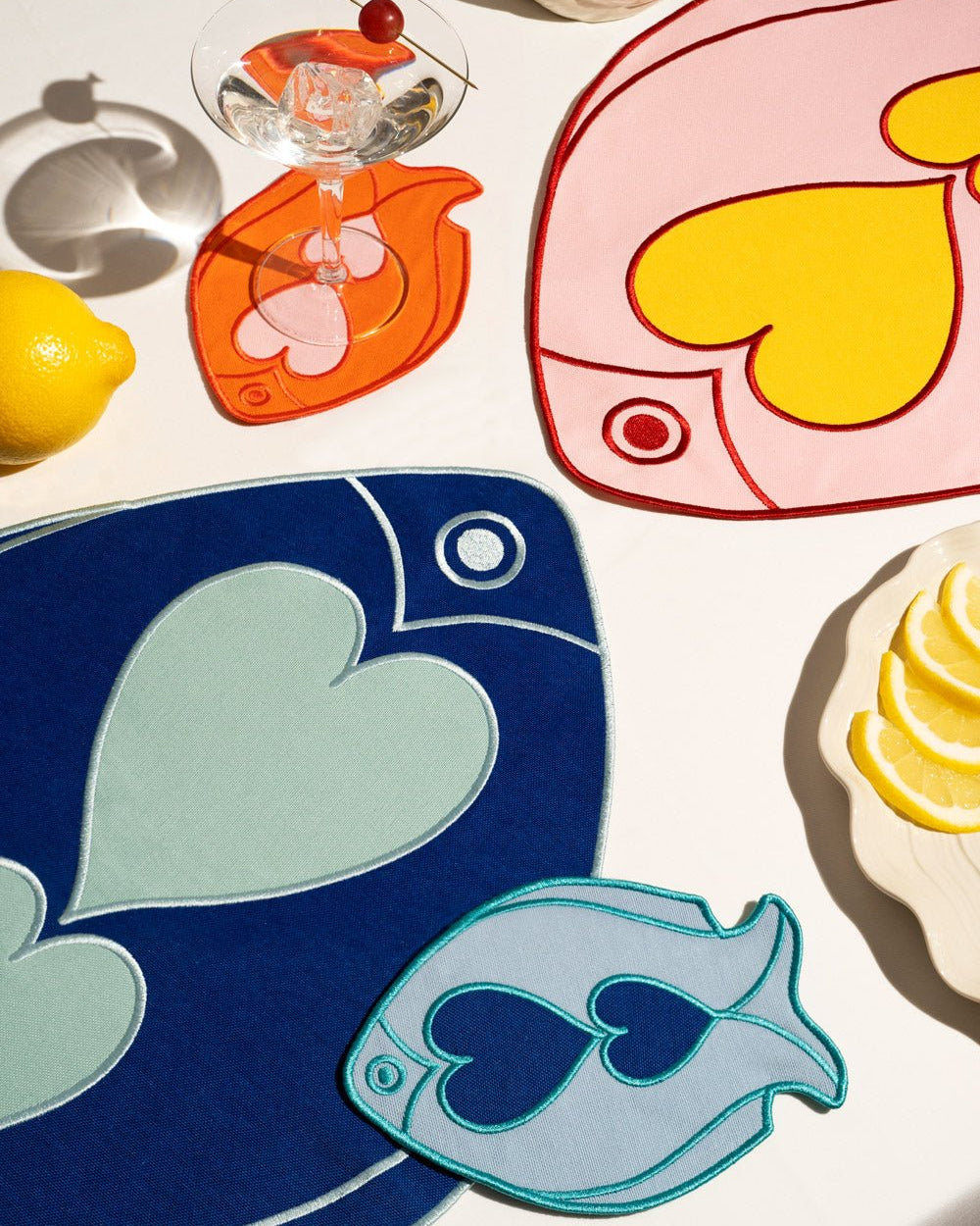 Add a splash of color with Octaevos Fish Splash Coasters (Set of 4), perfect for tables with fruit and drinks.