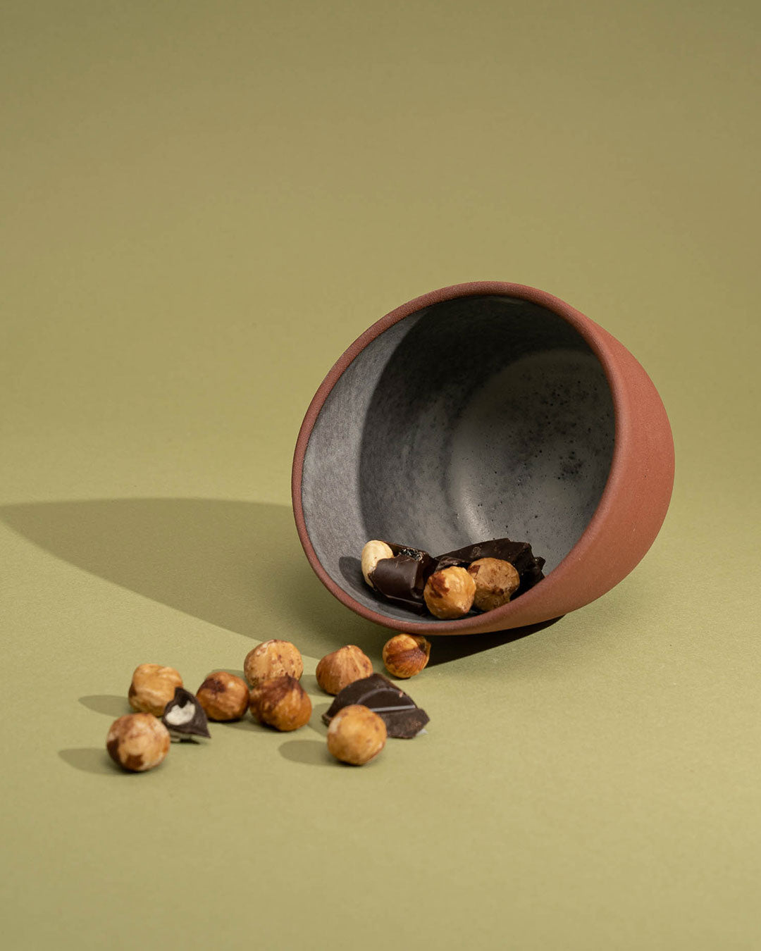 Tazza smussata in terracotta rossa