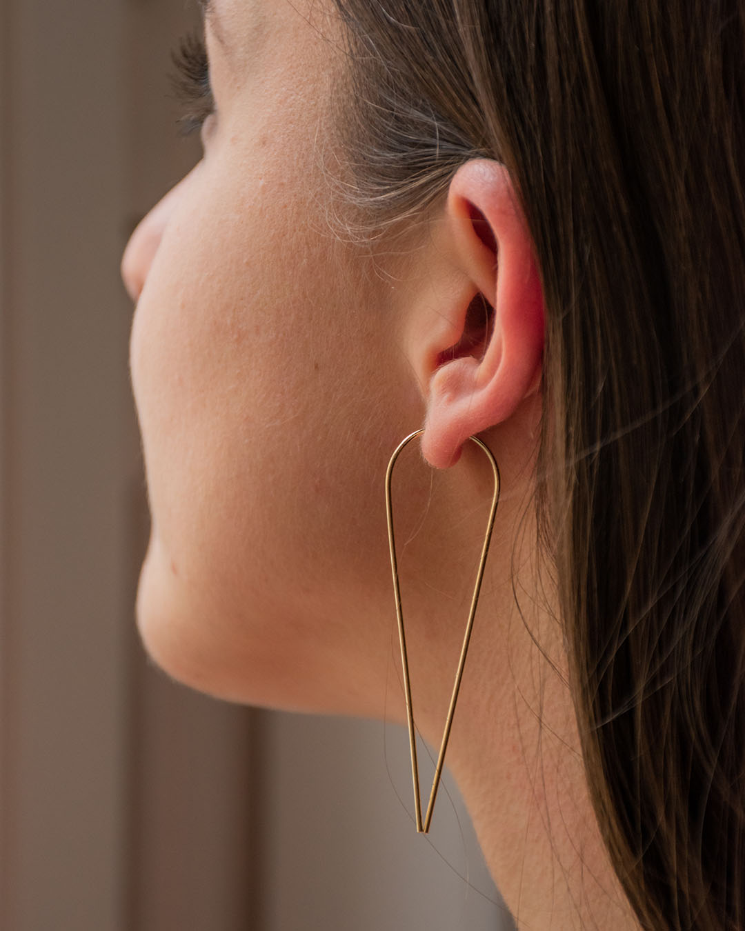 Sin earrings gold