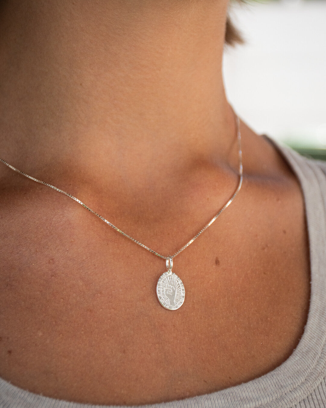 Fist necklace