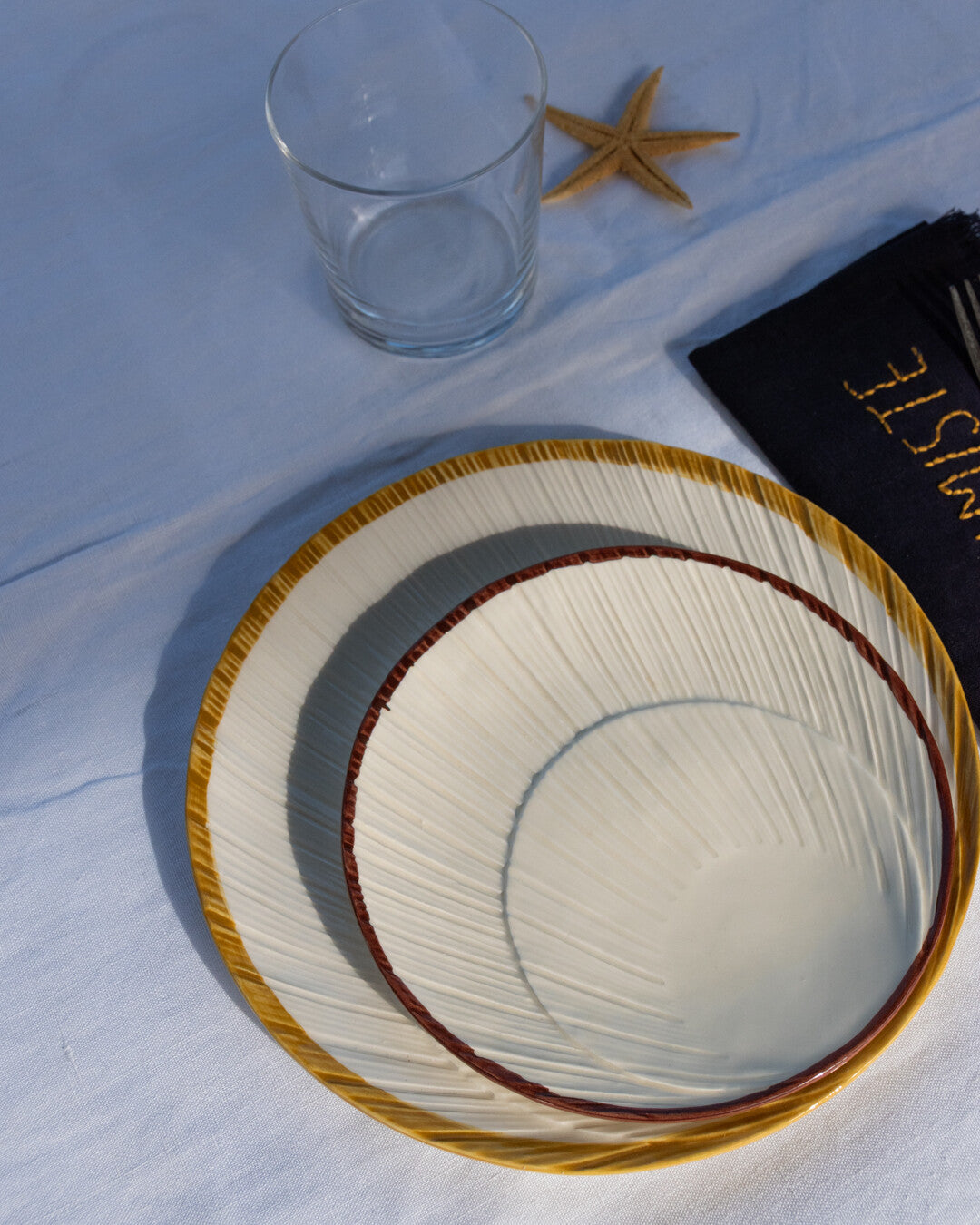 Konkylie side plate