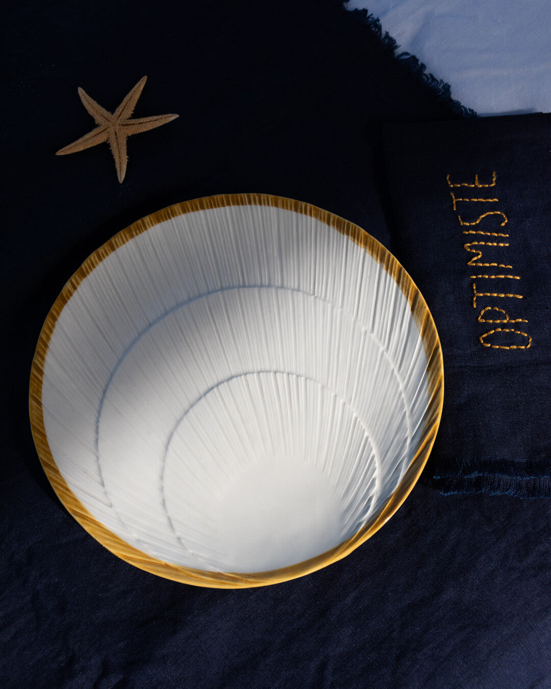Konkylie side plate