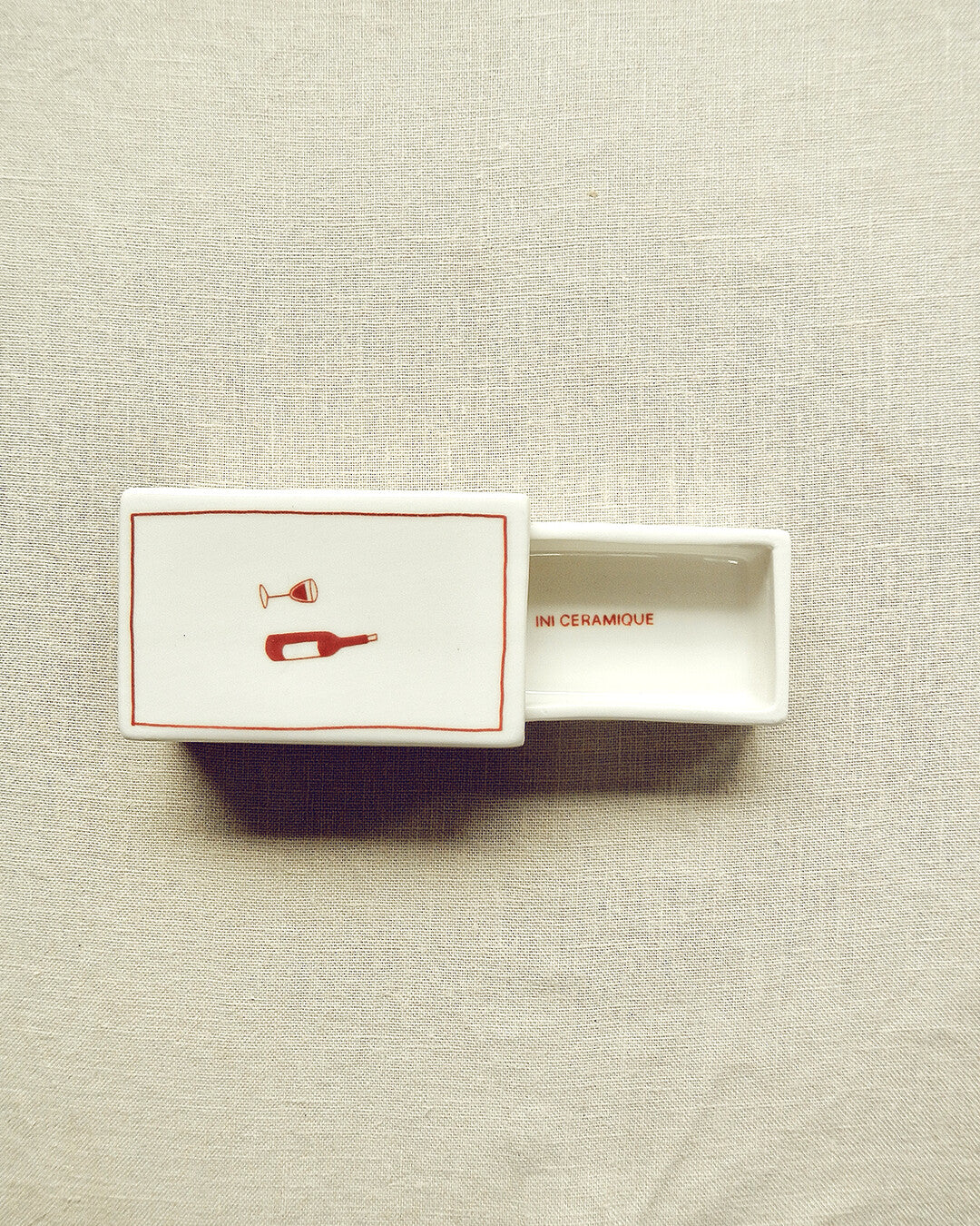 Scatola di fiammiferi illustrata in ceramica