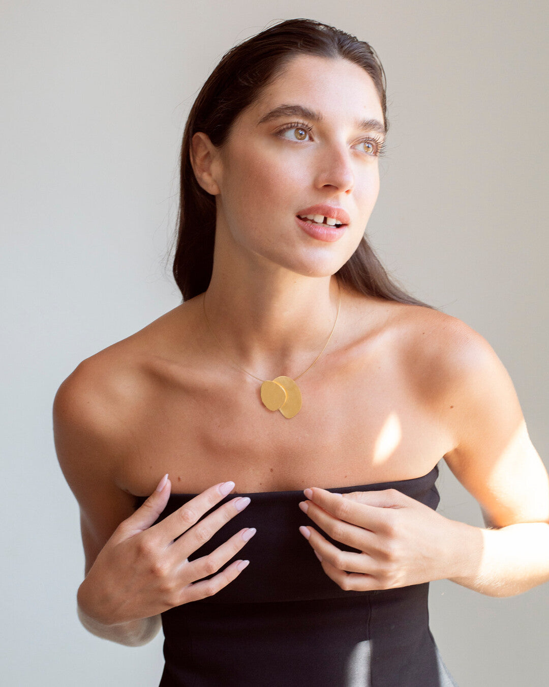 Golden necklace with pendant Eclipse