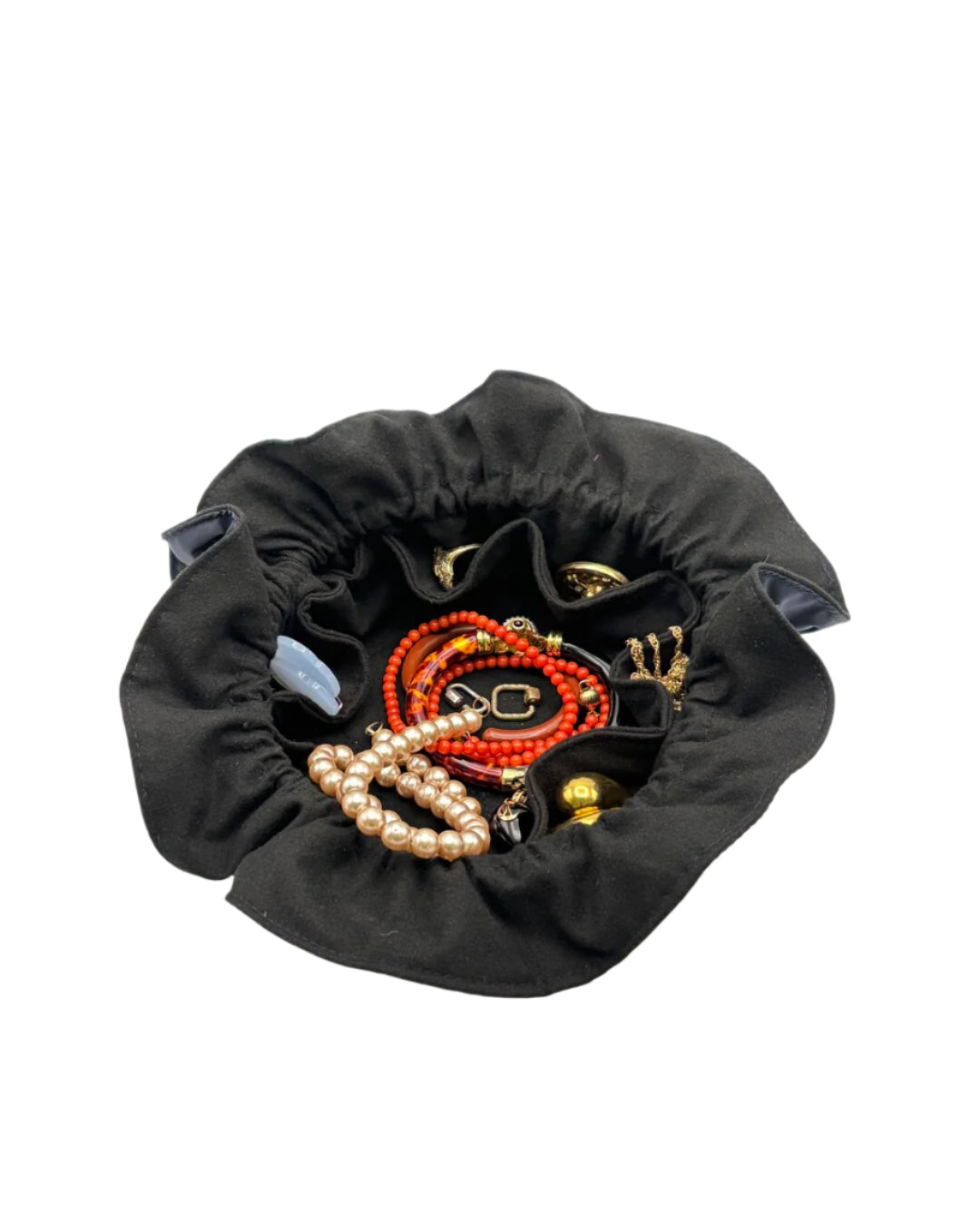 Black jewelry storage bag with necklaces and bracelets