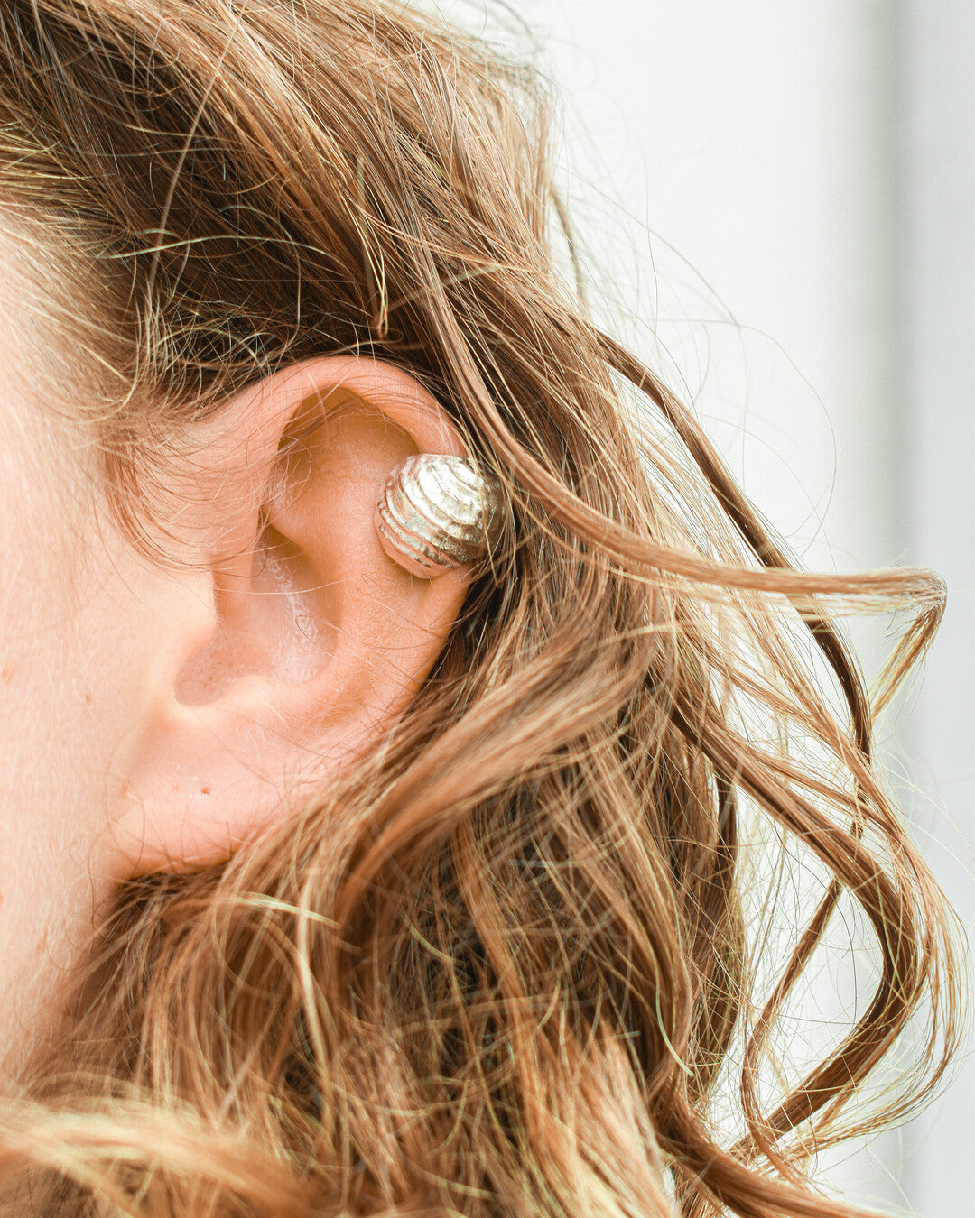 Orb ear cuff