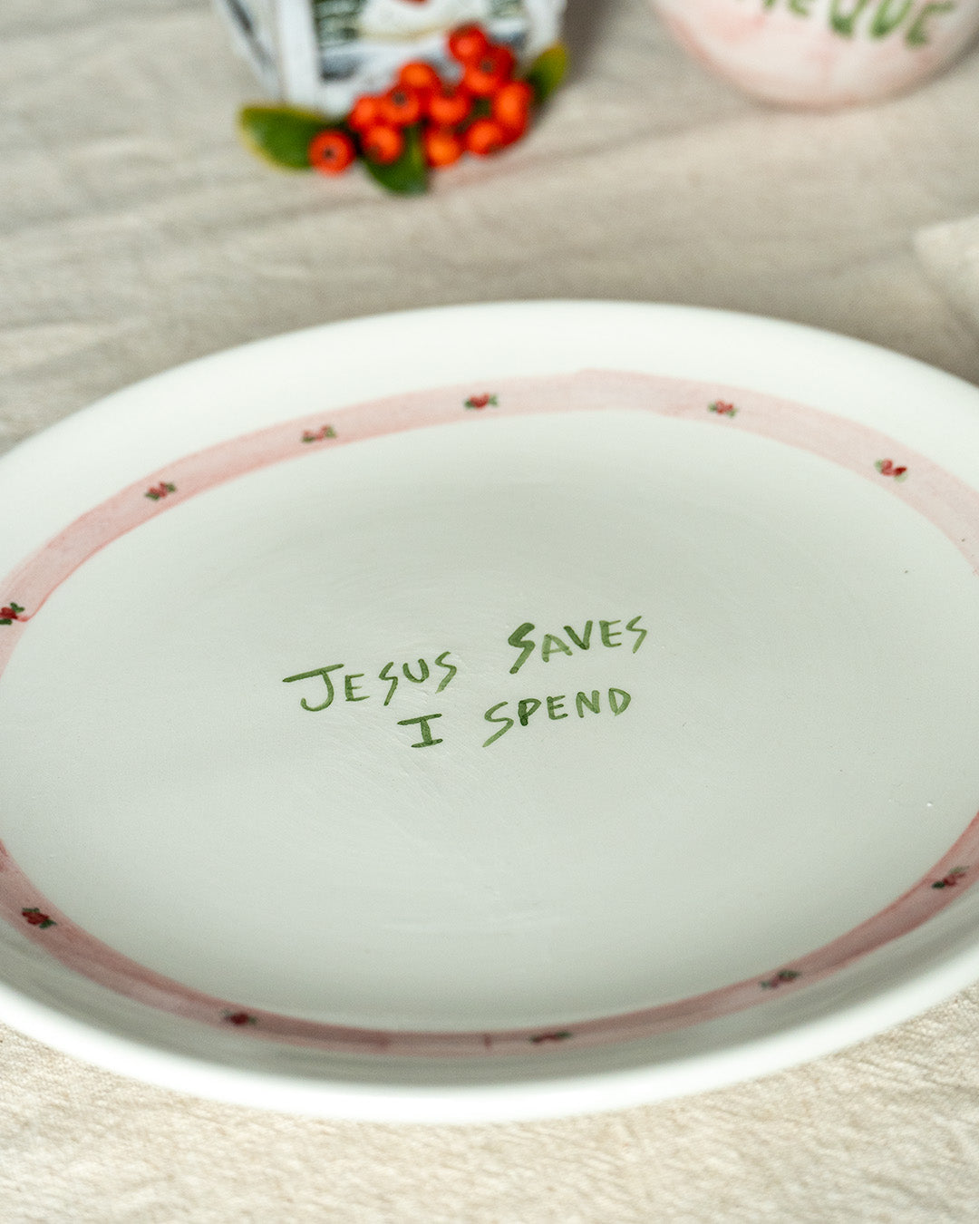 "Jesus Saves I Spend" plate