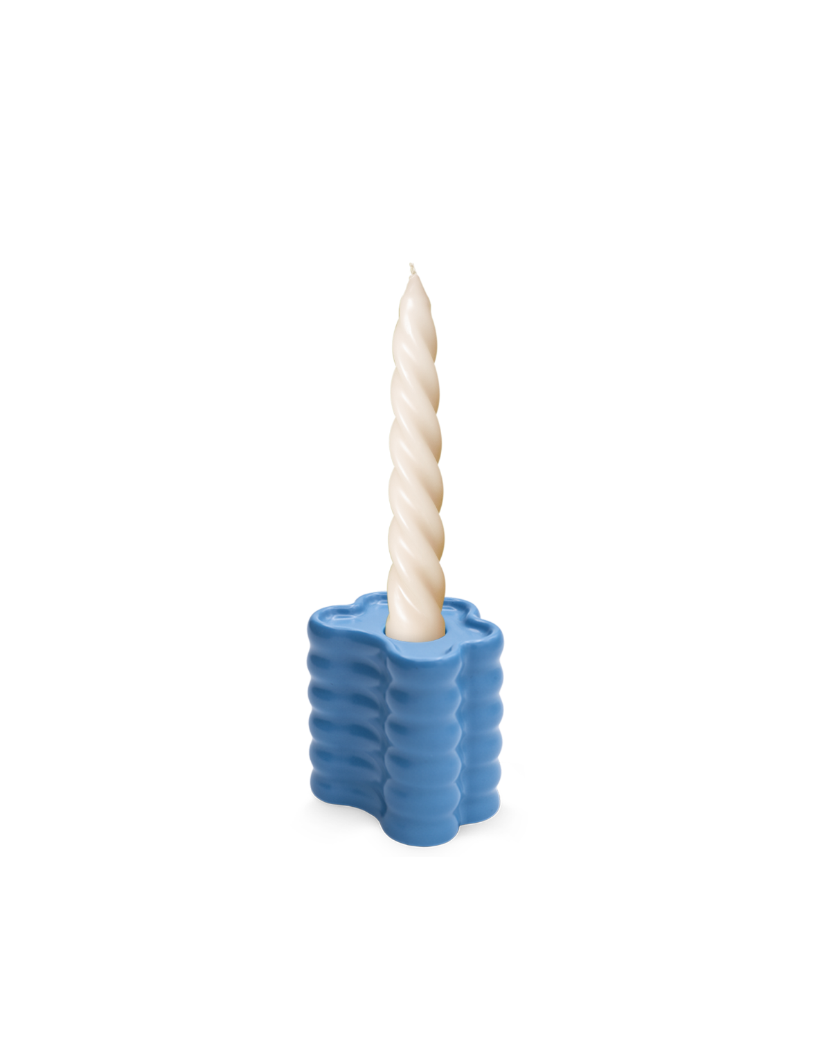 The Flora Candle Holder in Blue by OCTAEVO is a wavy, cloud-shaped ceramic holder for a twisted ivory candle.