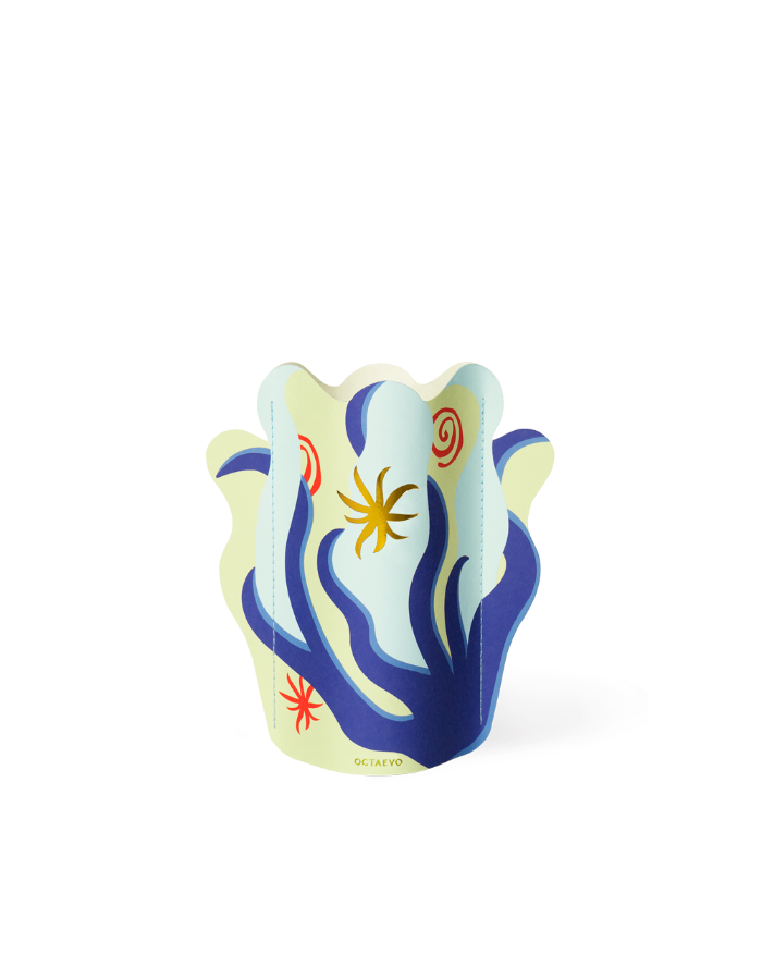 The OCTAEVO Amalfi Mini Paper Vase features abstract blue, yellow, and red shapes on a light background.