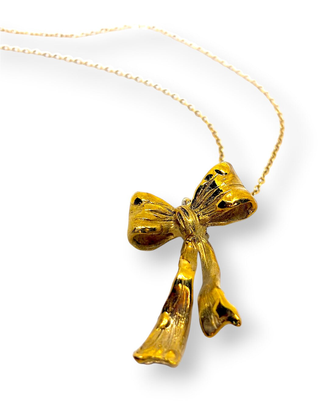 Soft bow pendant