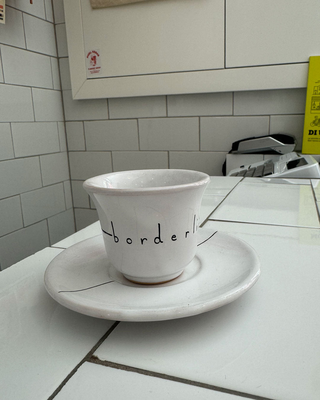 "Borderline" coffee cup and saucer