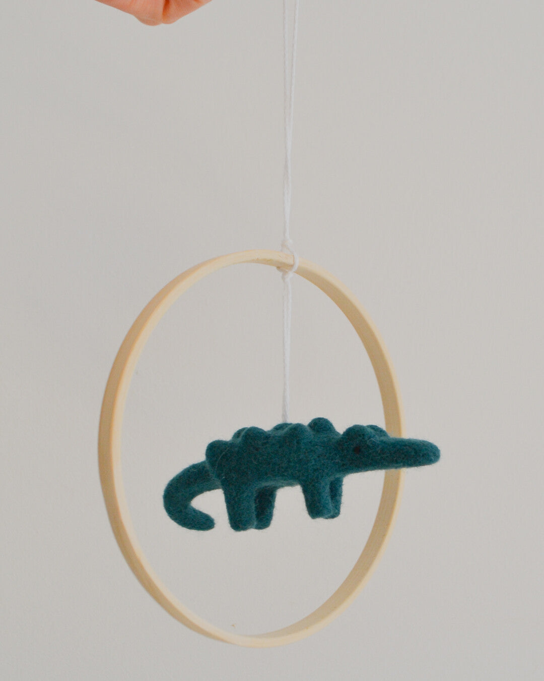 Crocodile needle-felted baby mobile