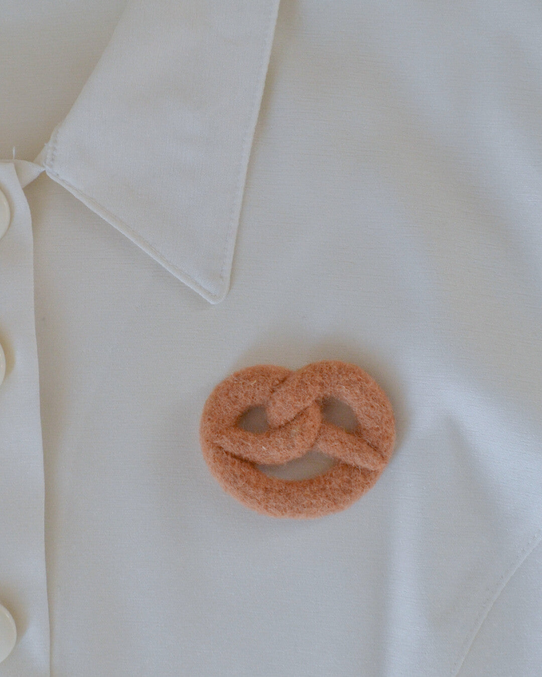 Pretzel needle-felted brooch