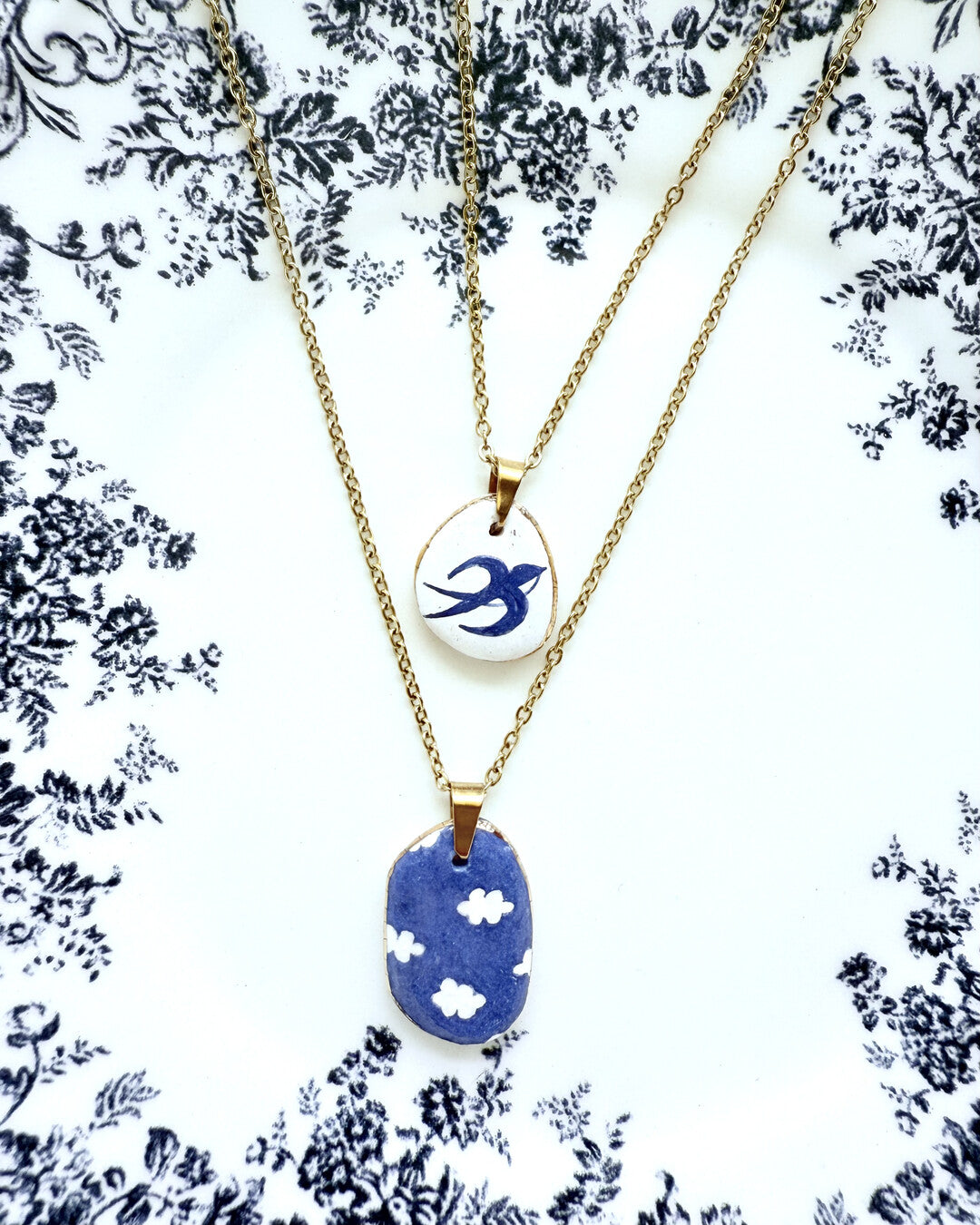 Swallow pendant and venetian box chain necklace