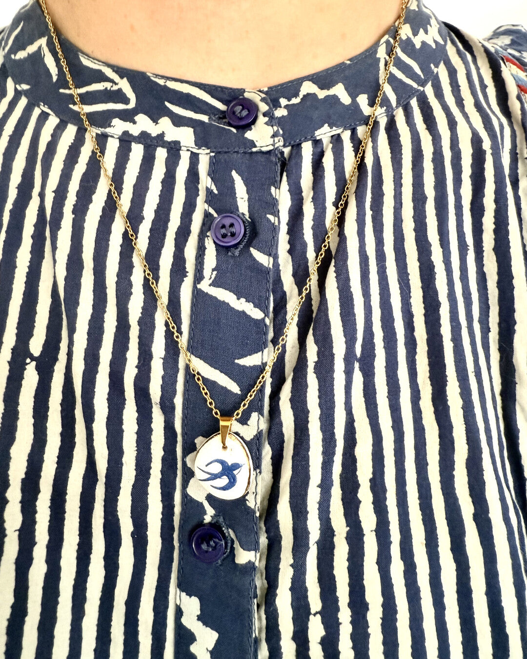 Swallow pendant and venetian box chain necklace