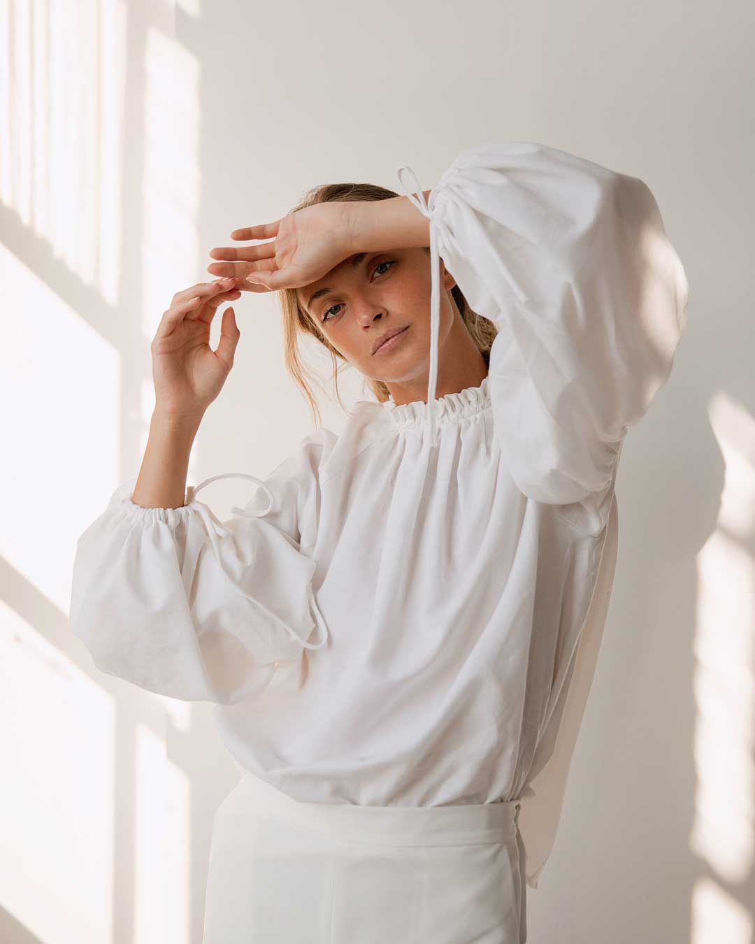 White Elastic loose fitting shirt