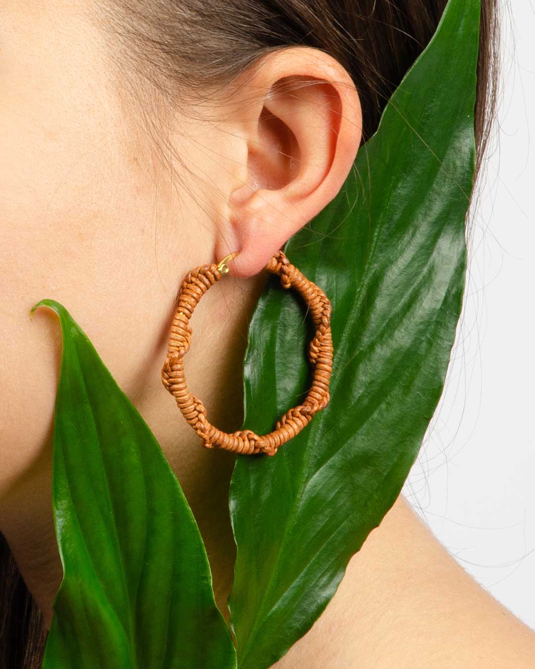 Hand-knitted leather earrings