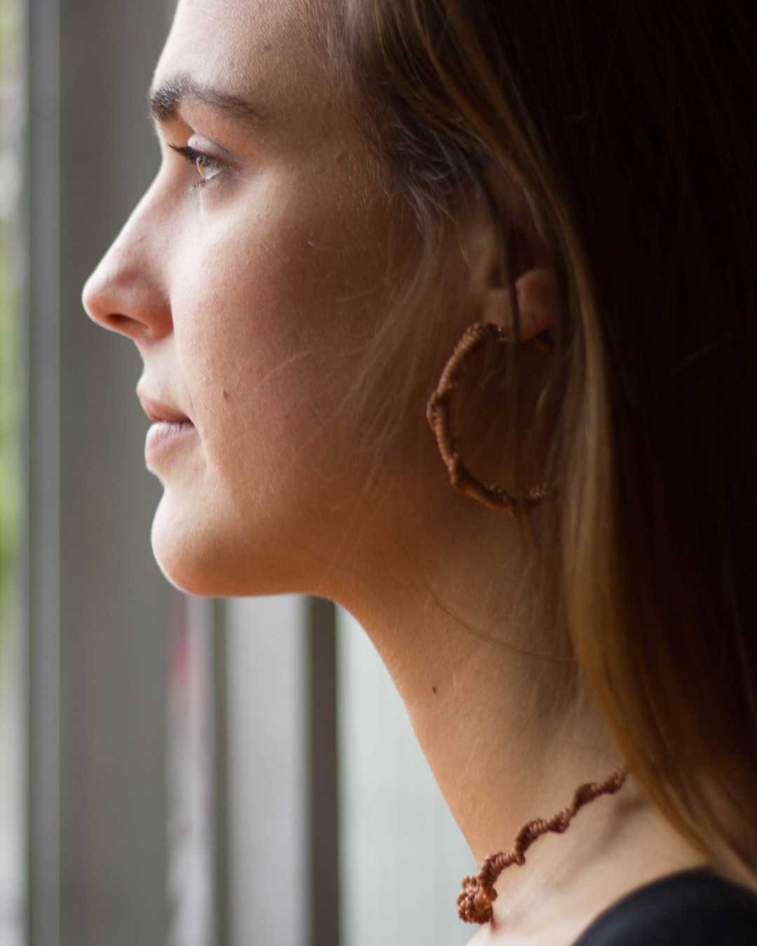 Hand-knitted leather earrings